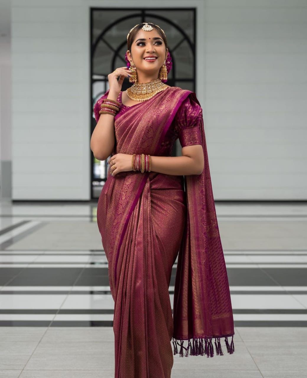 Wine Semi Soft Lichi Silk Saree With Gold Zari Weaving